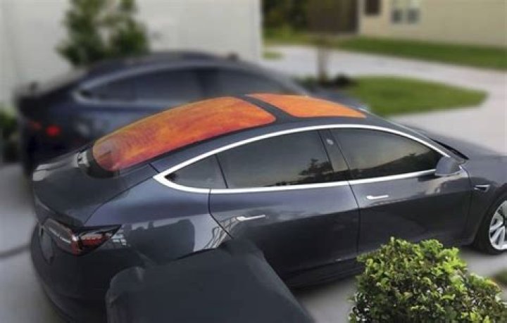 Why is Tesla roof orange?